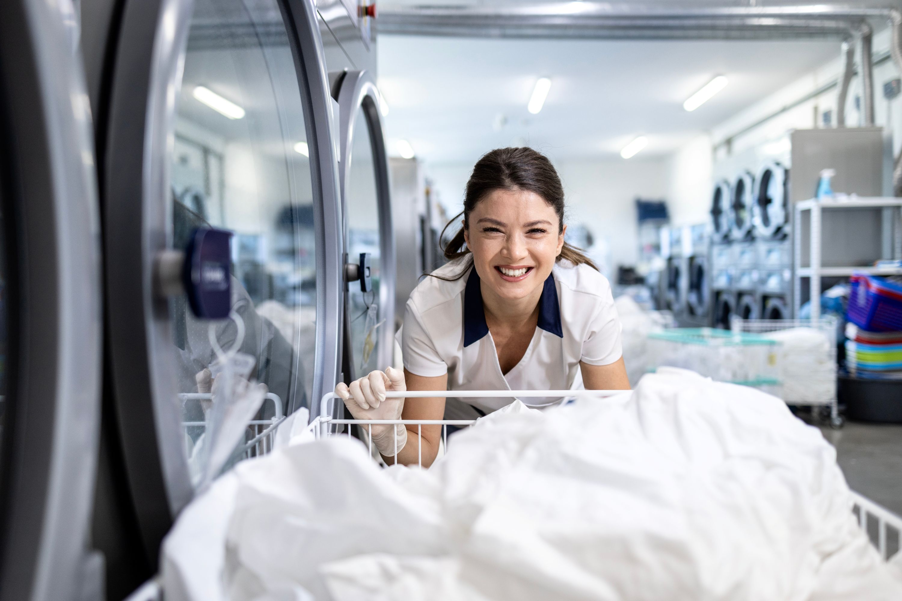 Laundry Workers Shutterstock 2592419513